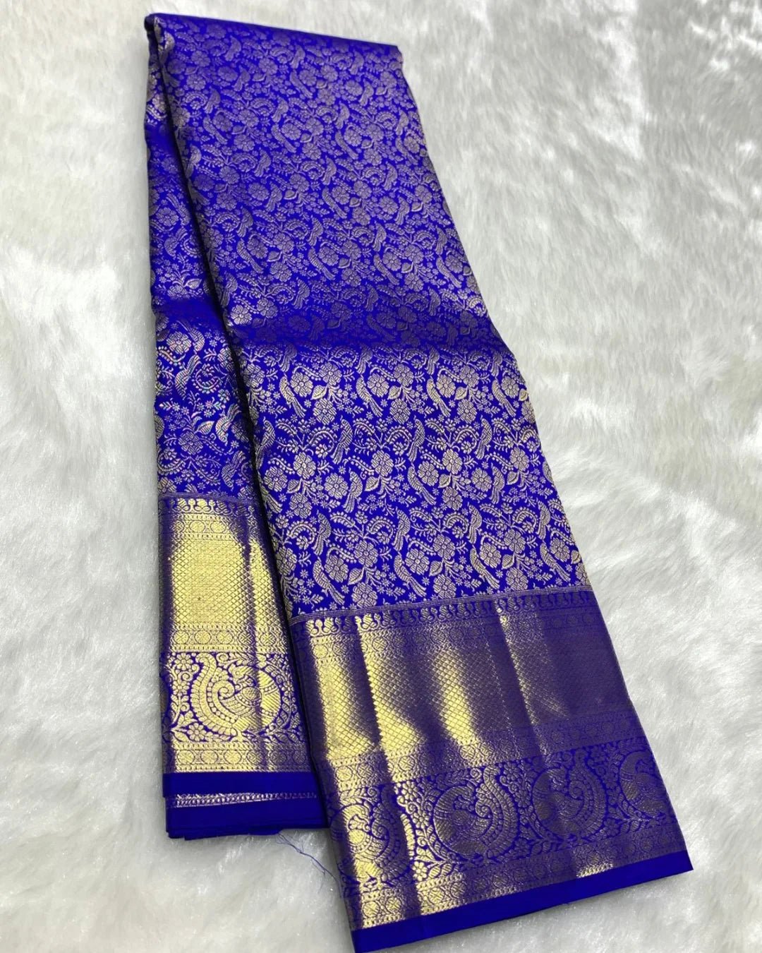 Fugacious Royal Blue Soft Banarasi Silk Saree With Chatoyant Blouse Piece