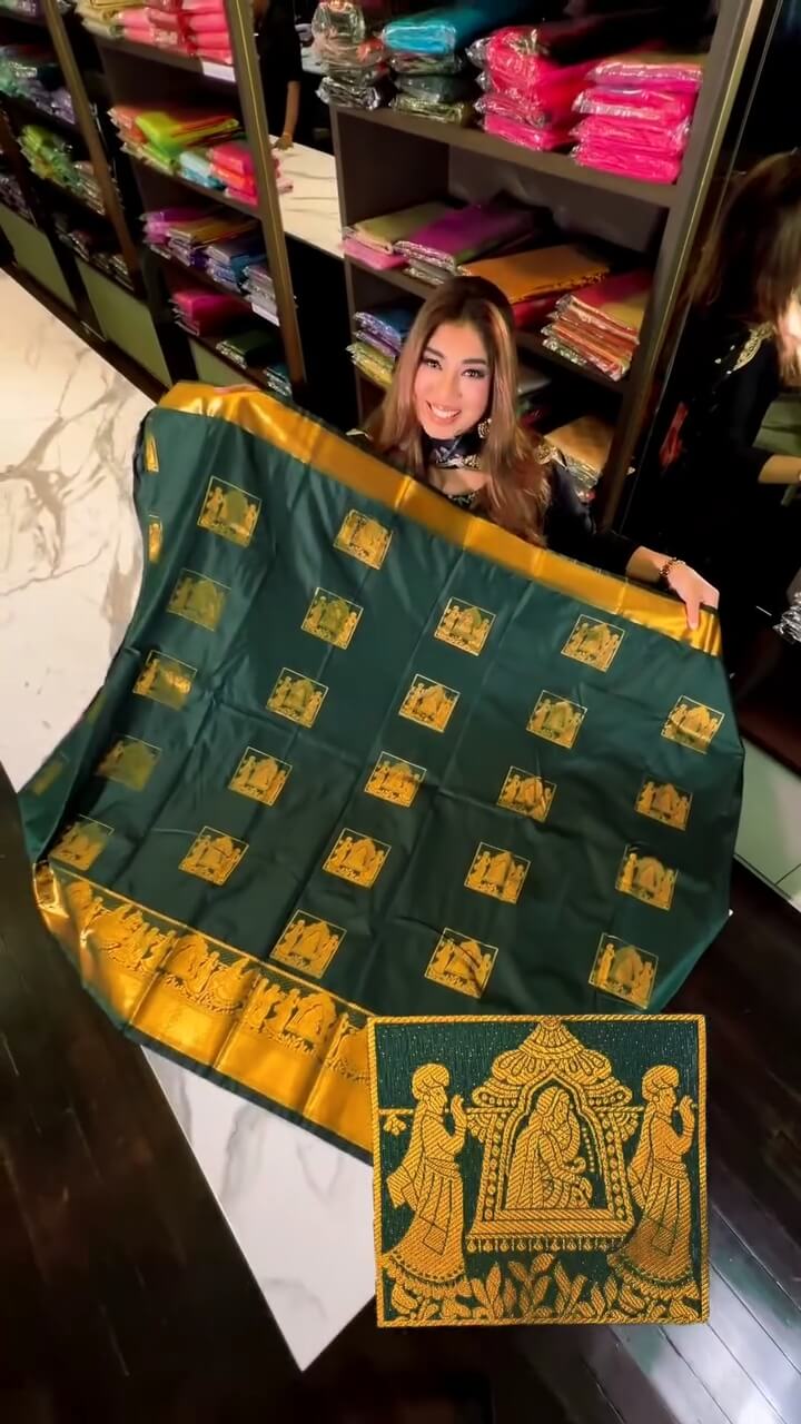 Fancifull Dark Green Soft Banarasi Silk Saree With Demanding Blouse Piece