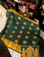 Fancifull Dark Green Soft Banarasi Silk Saree With Demanding Blouse Piece