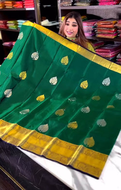 Forbearance Dark Green Soft Banarasi Silk Saree With Mesmeric Blouse Piece