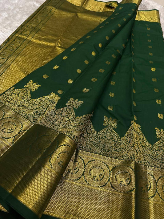 Prominent Dark Green Pure Zari Weaving Banarasi Silk Saree With Innovative Blouse Piece