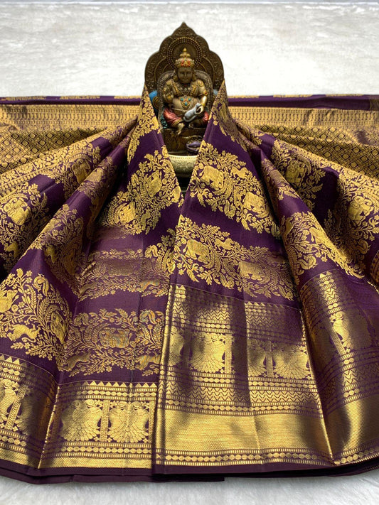 Deserving Purple Pure Zari Weaving Banarasi Silk Saree With Captivating Blouse Piece