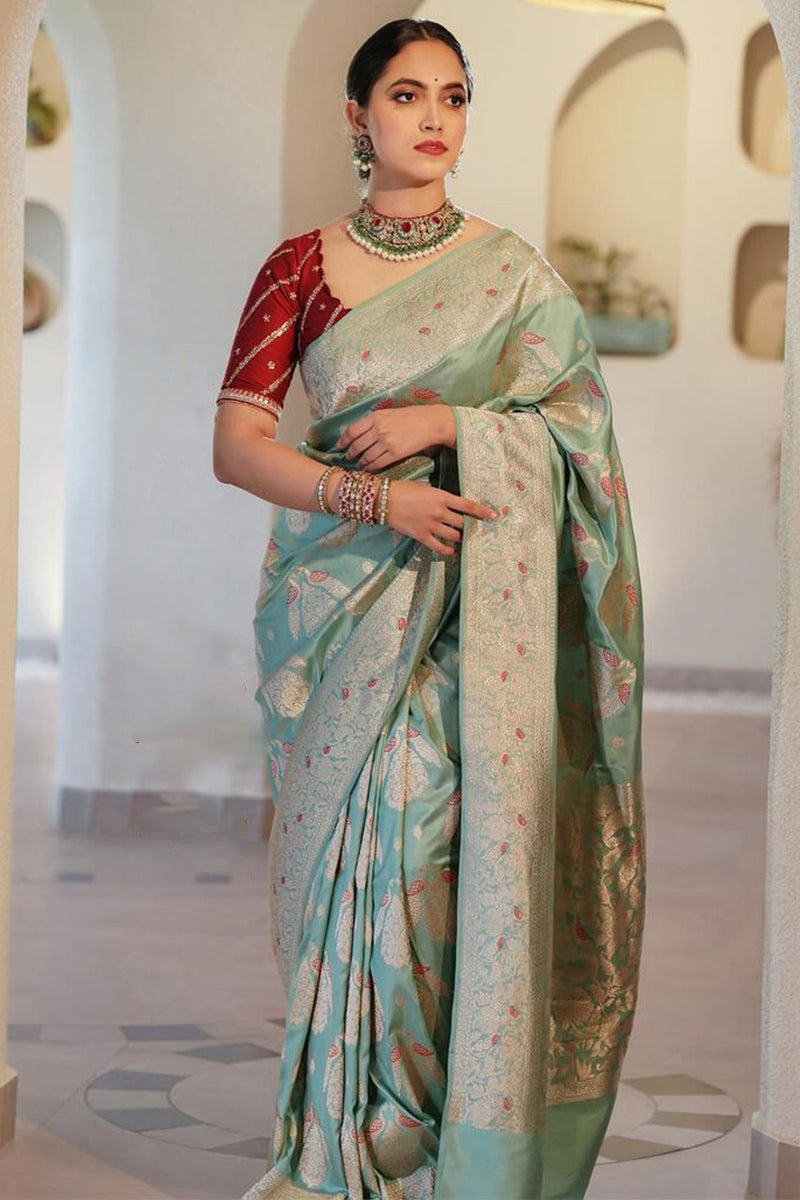 Gleaming Sea Green Soft Silk Saree With Energetic Blouse Piece