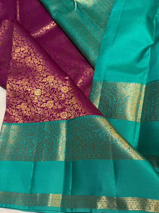 Cynosure Purple Pure Zari Weaving Banarasi Silk Saree With Enthralling Blouse Piece