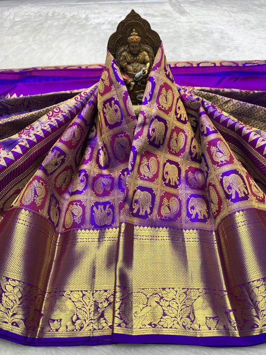 Appealing Royal Purple Pure Zari Weaving Banarasi Silk Saree With Desirable Blouse Piece