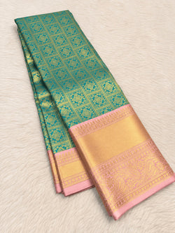 Demanding Sea Green Pure Banarasi Silk Saree With Tremendous Blouse Piece