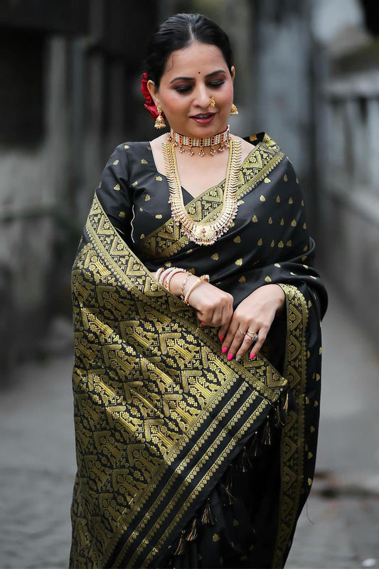 Stunner Black Soft Silk Saree With Demure Blouse Piece