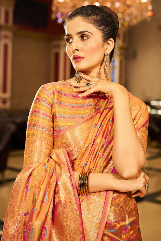 Diaphanous Orange Organza Silk Saree With Opulent Blouse Piece