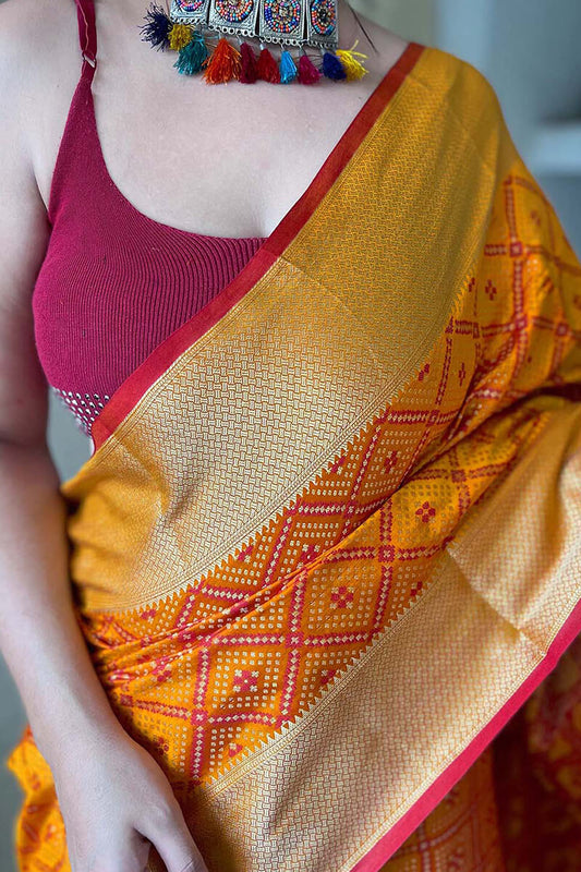 Comely Mustard Patola Silk Saree with Forbearance Blouse Piece