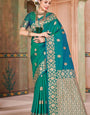 Scintilla Rama Soft Banarasi Silk Saree With Eloquence Blouse Piece