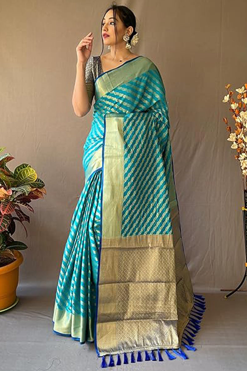 Embellished Firozi Soft Banarasi Silk Saree With Delectable Blouse Piece