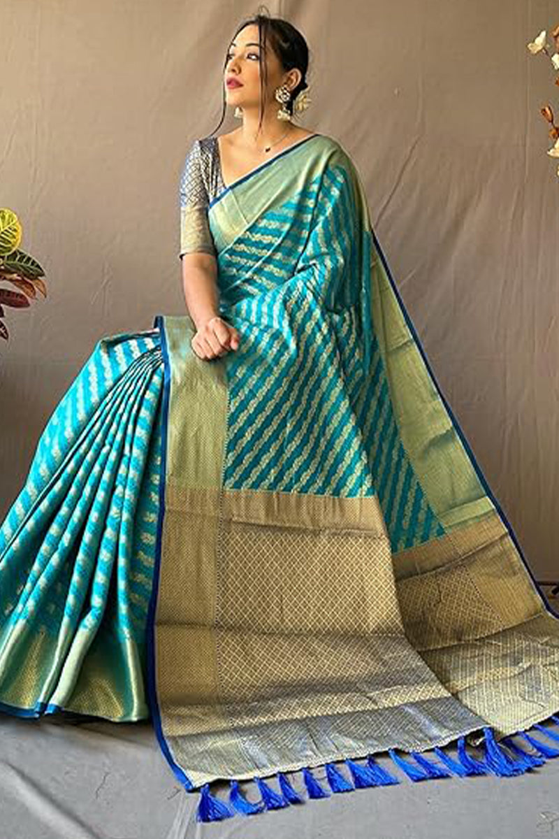 Embellished Firozi Soft Banarasi Silk Saree With Delectable Blouse Piece