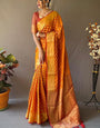 Cynosure Mustard Soft Banarasi Silk Saree With Prettiest Blouse Piece