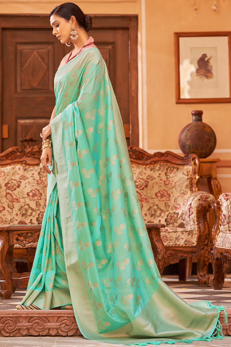 Demanding Turquoise Banarasi Satin Silk Saree With Lustrous Blouse