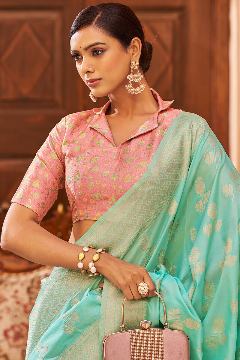 Demanding Turquoise Banarasi Satin Silk Saree With Lustrous Blouse