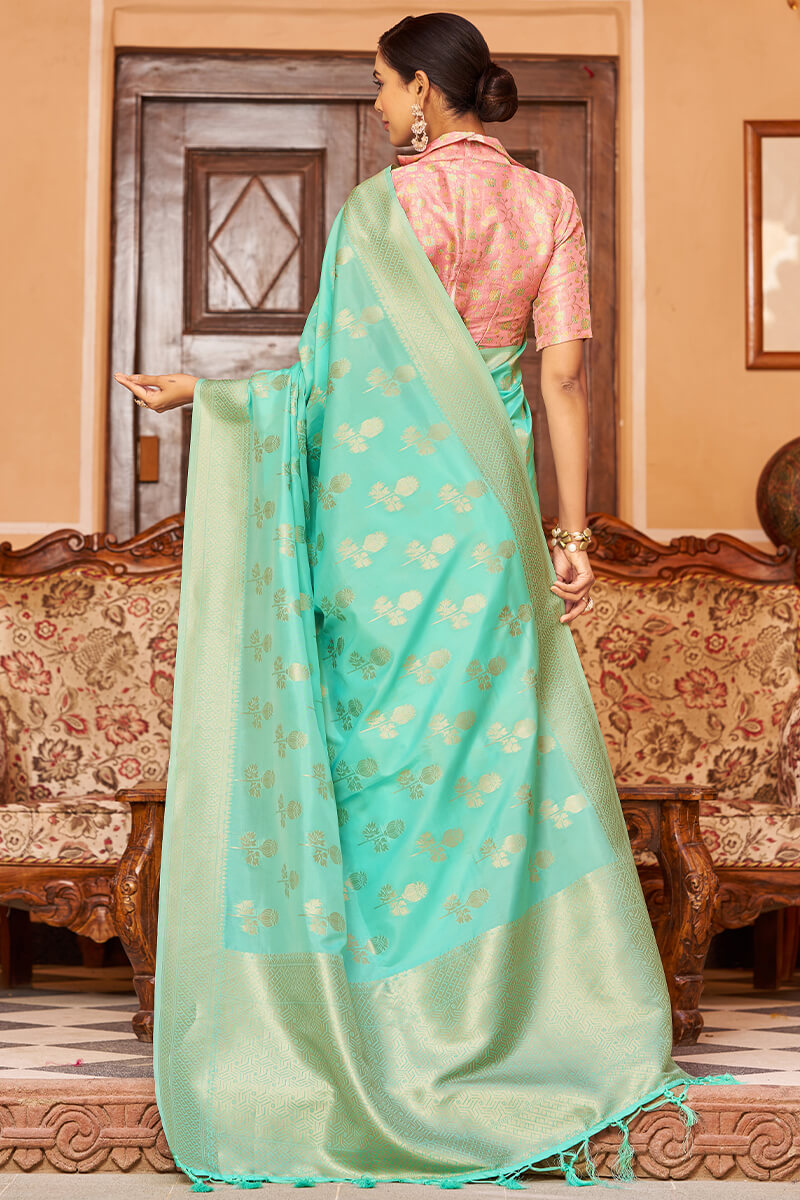 Demanding Turquoise Banarasi Satin Silk Saree With Lustrous Blouse