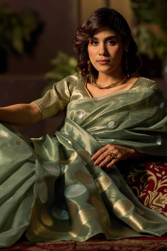 Innovative Sea Green Soft Banarasi Tissue Silk Saree With Majestic Blouse Piece