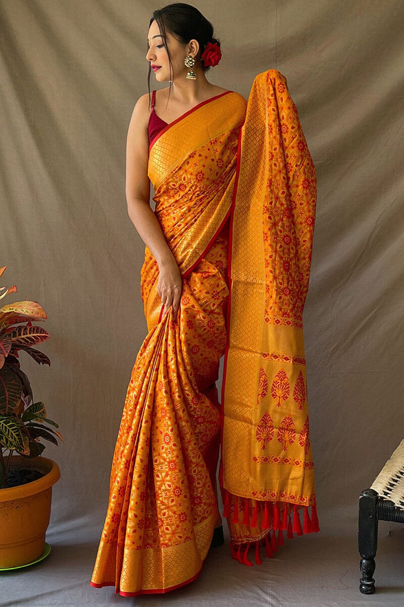Pleasurable Mustard Patola Silk Saree with Sumptuous Blouse Piece