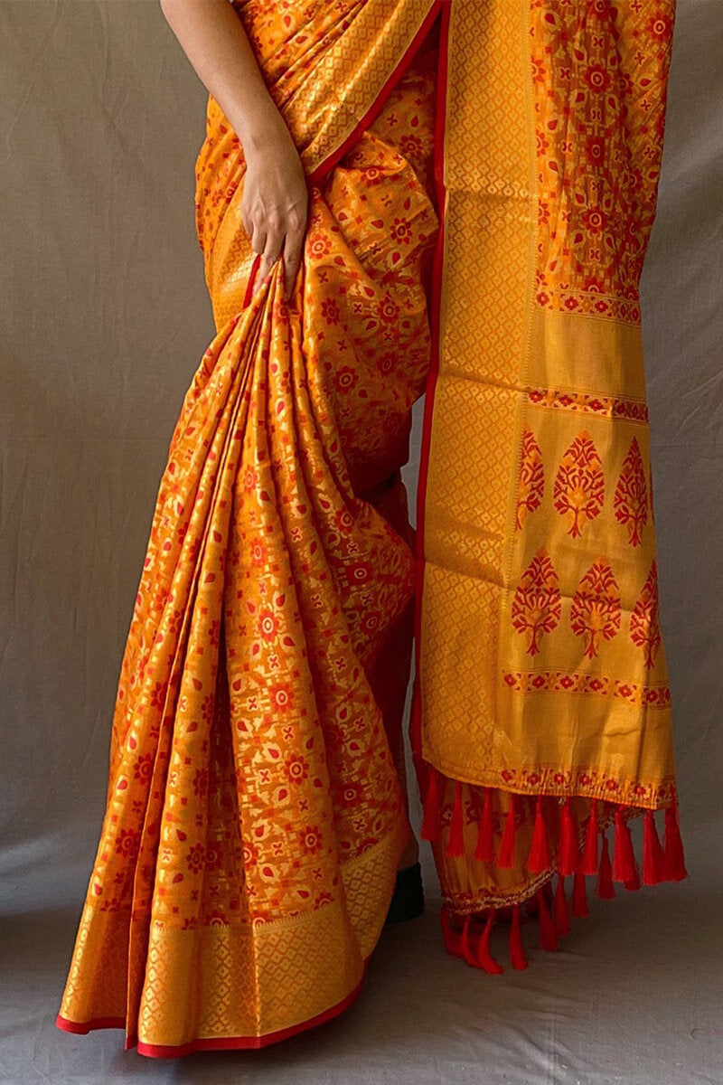 Pleasurable Mustard Patola Silk Saree with Sumptuous Blouse Piece