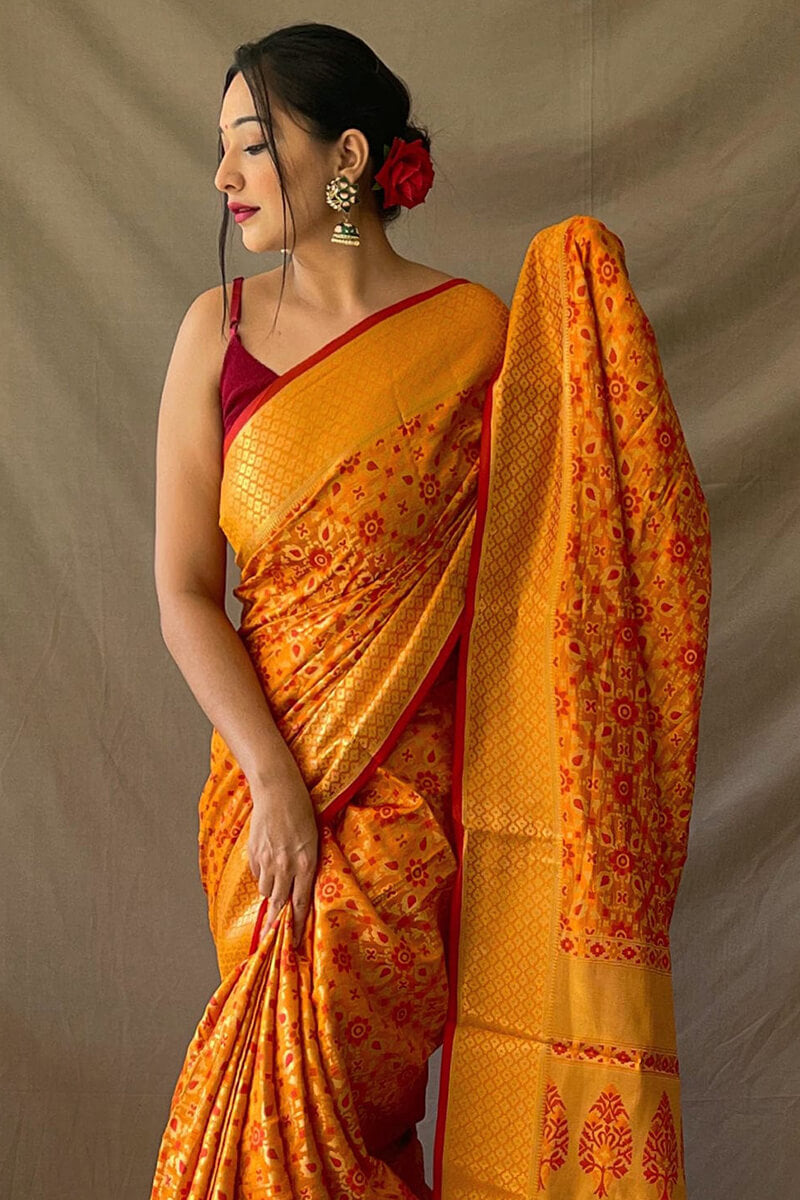 Pleasurable Mustard Patola Silk Saree with Sumptuous Blouse Piece