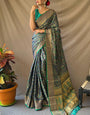 Traditional Navy Blue Patola Silk Saree with Staggering Blouse Piece