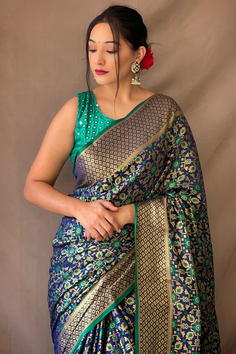 Traditional Navy Blue Patola Silk Saree with Staggering Blouse Piece