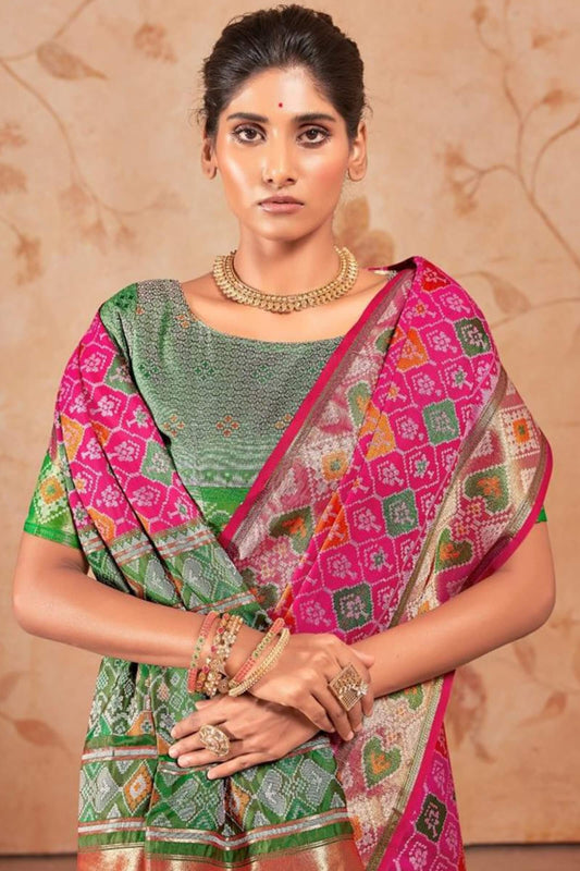 Lissome Dark Pink Patola Silk Saree with Prominent Blouse Piece
