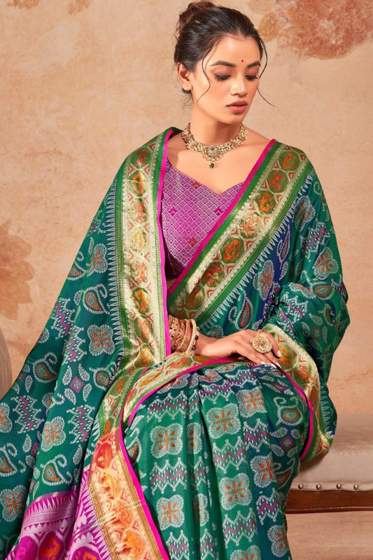 Whimsical Green Patola Silk Saree with Opulent Blouse Piece