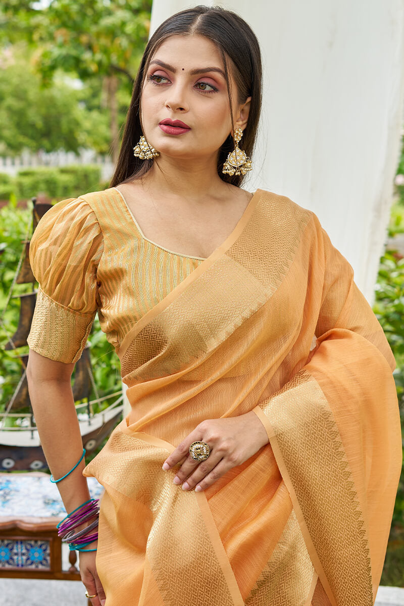 Smart Peach Cotton Silk Saree With Most Splendiferous Blouse Piece