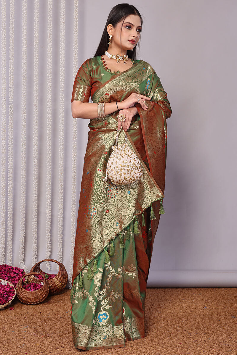 Entrancing Green Soft Banarasi Silk Saree With Quixotic Blouse Piece