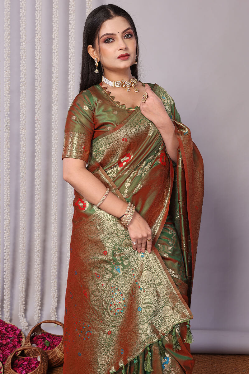 Entrancing Green Soft Banarasi Silk Saree With Quixotic Blouse Piece