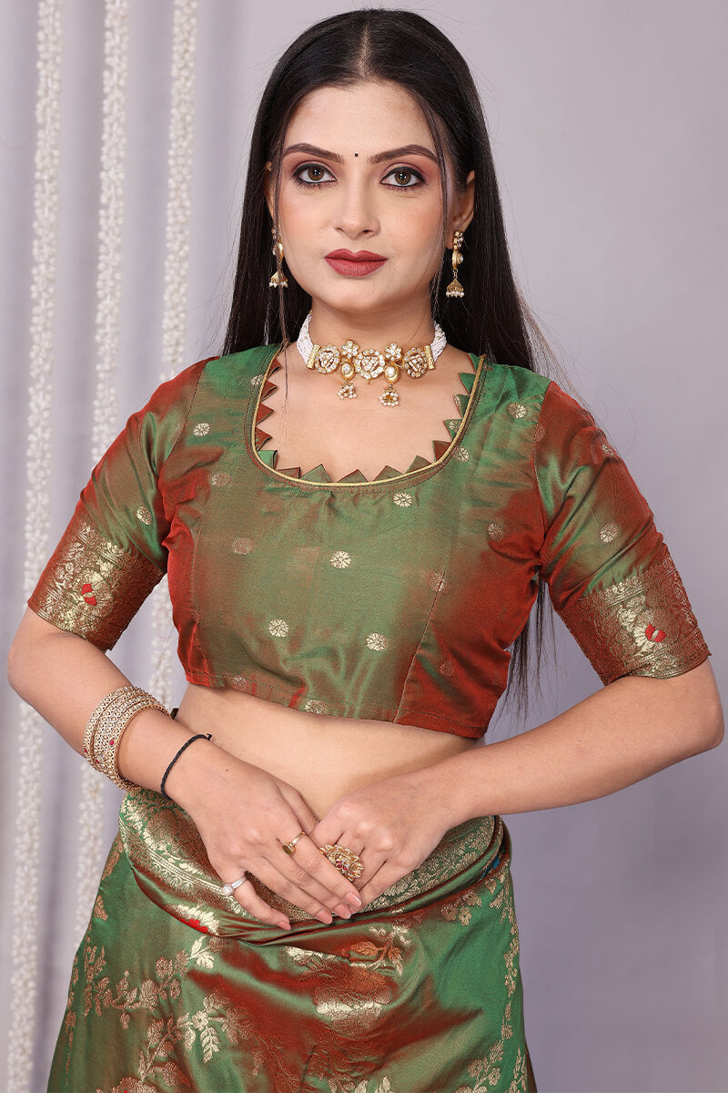 Entrancing Green Soft Banarasi Silk Saree With Quixotic Blouse Piece