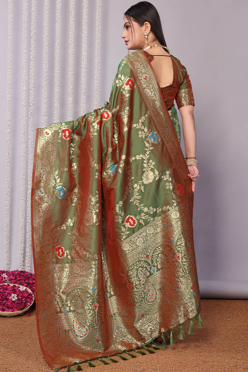 Entrancing Green Soft Banarasi Silk Saree With Quixotic Blouse Piece