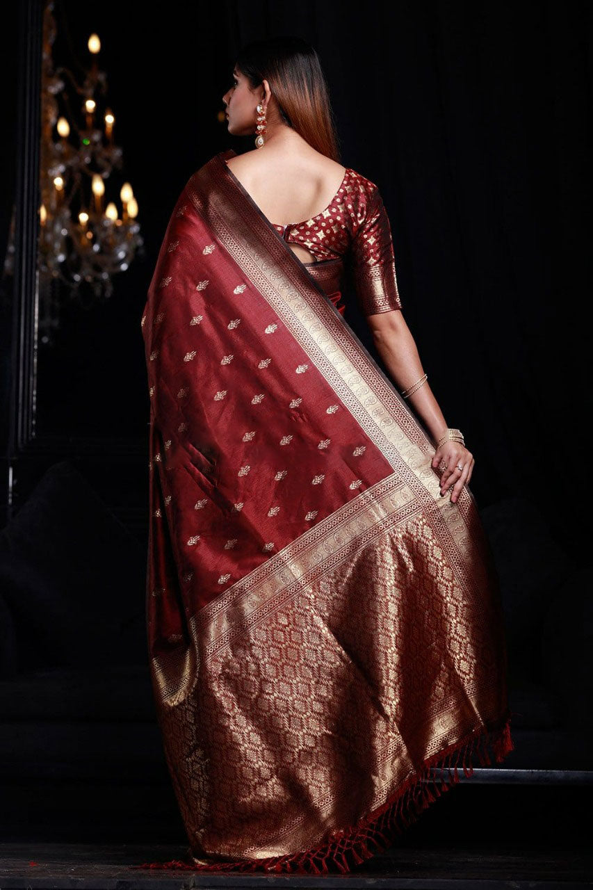 Lassitude Maroon Banarasi Silk Saree With Smashing Blouse Piece