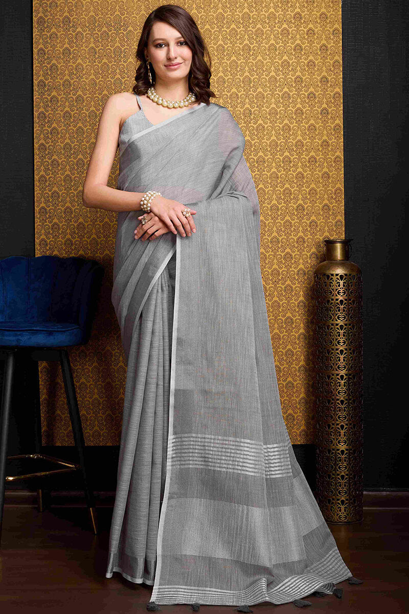 Eye-catching Grey Cotton Silk Saree With Susurrous Blouse Piece