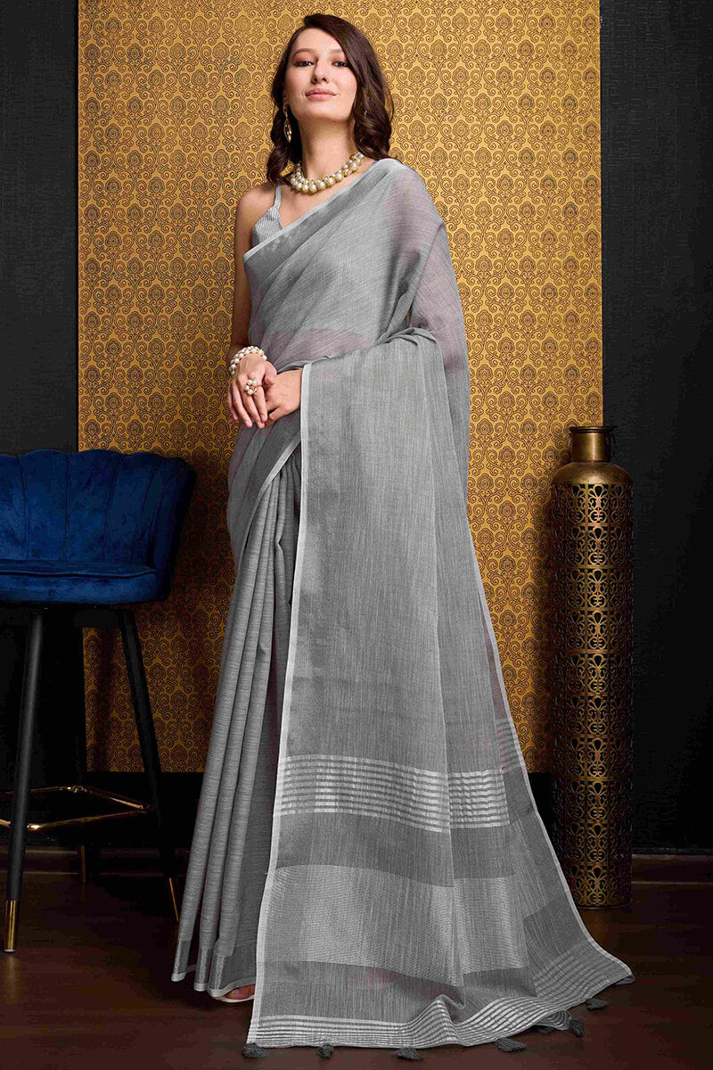 Eye-catching Grey Cotton Silk Saree With Susurrous Blouse Piece