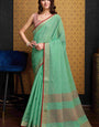 Gratifying Sea Green Cotton Silk Saree With Cynosure Blouse Piece