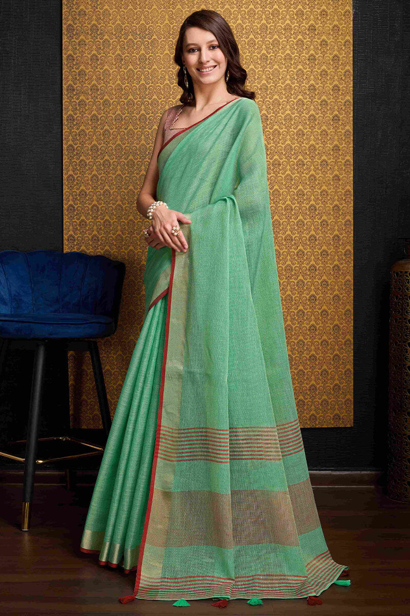 Gratifying Sea Green Cotton Silk Saree With Cynosure Blouse Piece