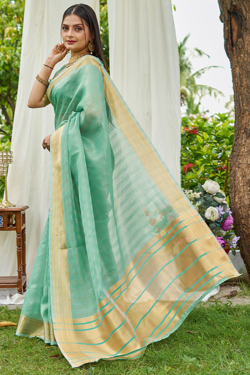 Tantalizing Turquoise Cotton Silk Saree With Zephyr Blouse Piece