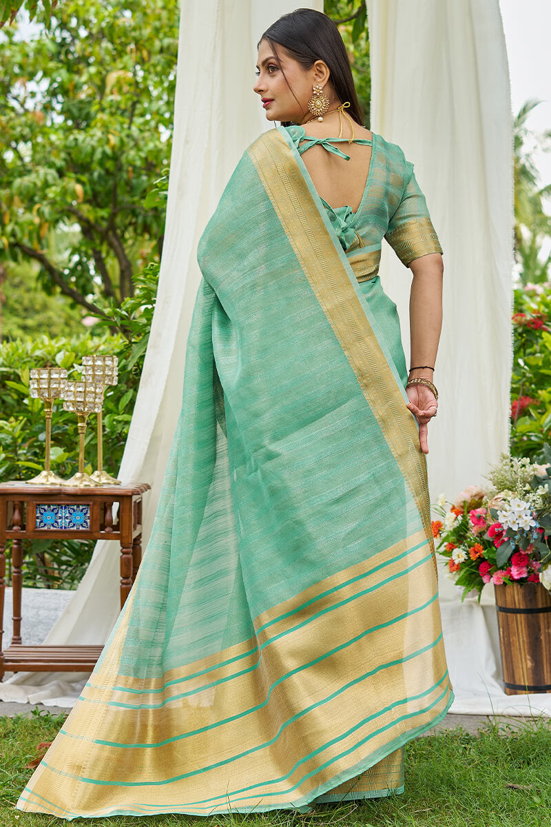 Tantalizing Turquoise Cotton Silk Saree With Zephyr Blouse Piece