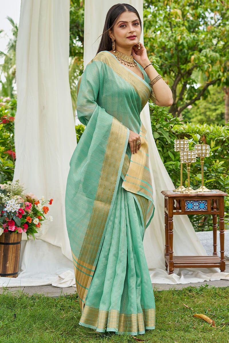 Tantalizing Turquoise Cotton Silk Saree With Zephyr Blouse Piece