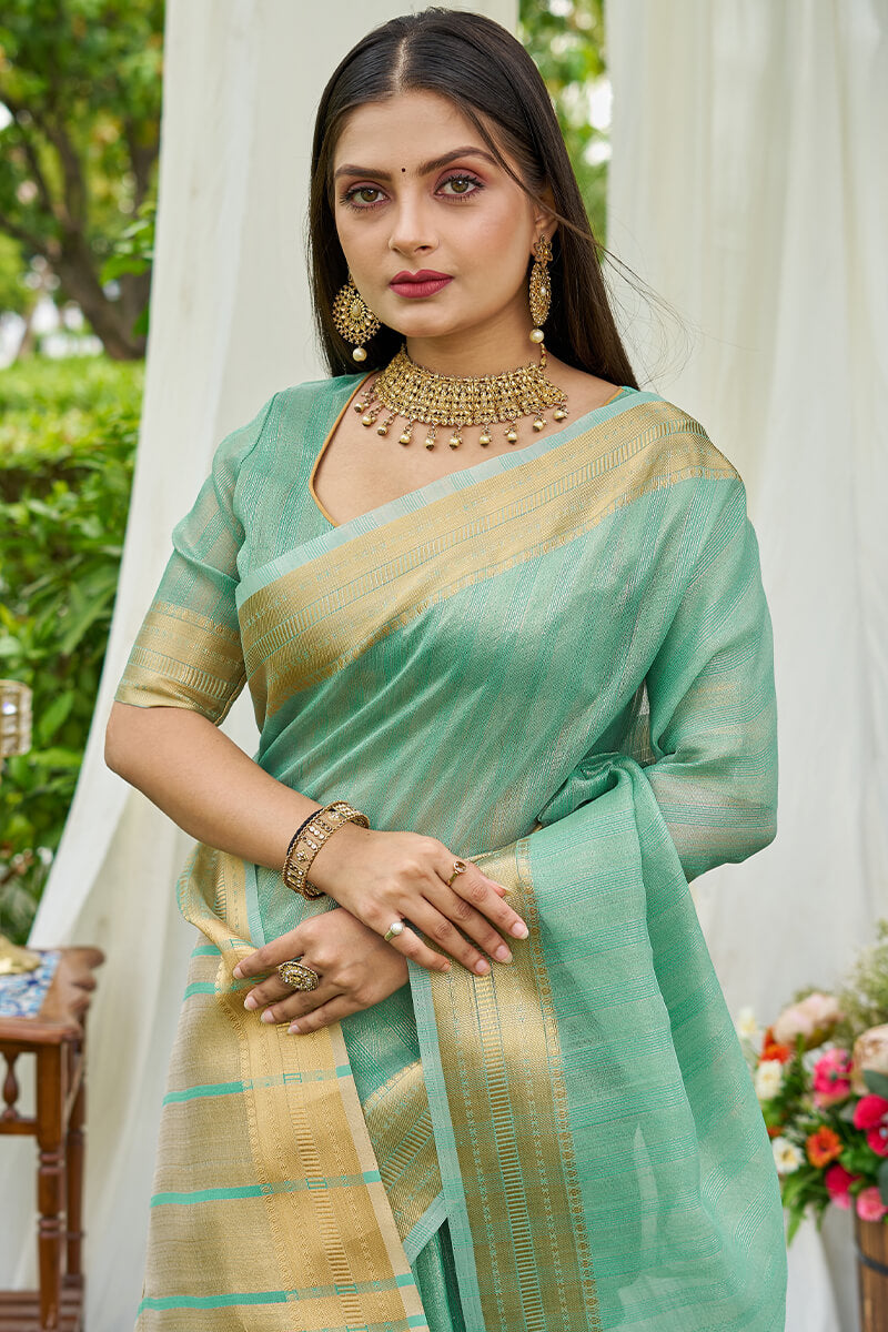 Tantalizing Turquoise Cotton Silk Saree With Zephyr Blouse Piece