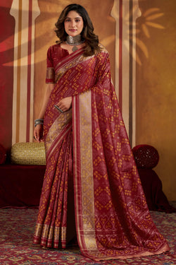 Glorious Maroon Patola Silk Saree with Allure Blouse Piece