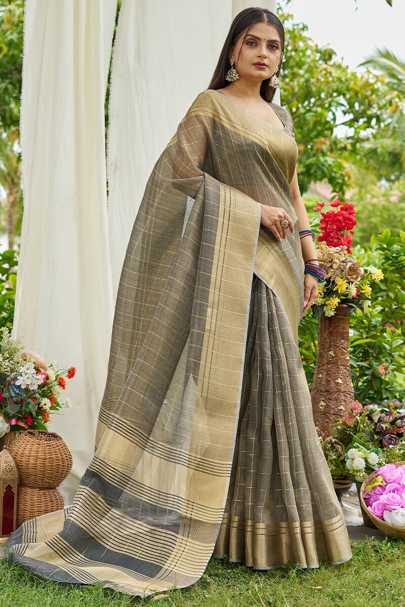 Symmetrical Grey Soft Banarasi Tissue Silk Saree With Twirling Blouse Piece