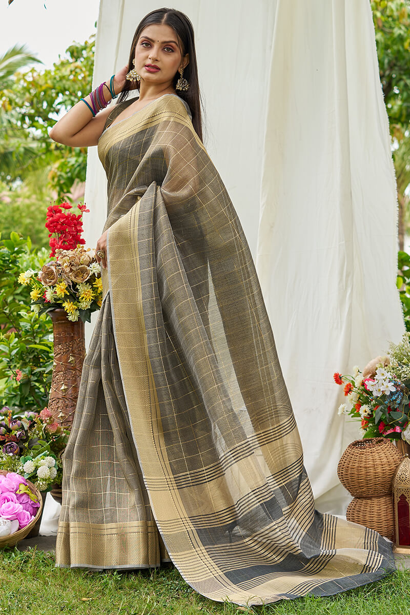 Symmetrical Grey Soft Banarasi Tissue Silk Saree With Twirling Blouse Piece