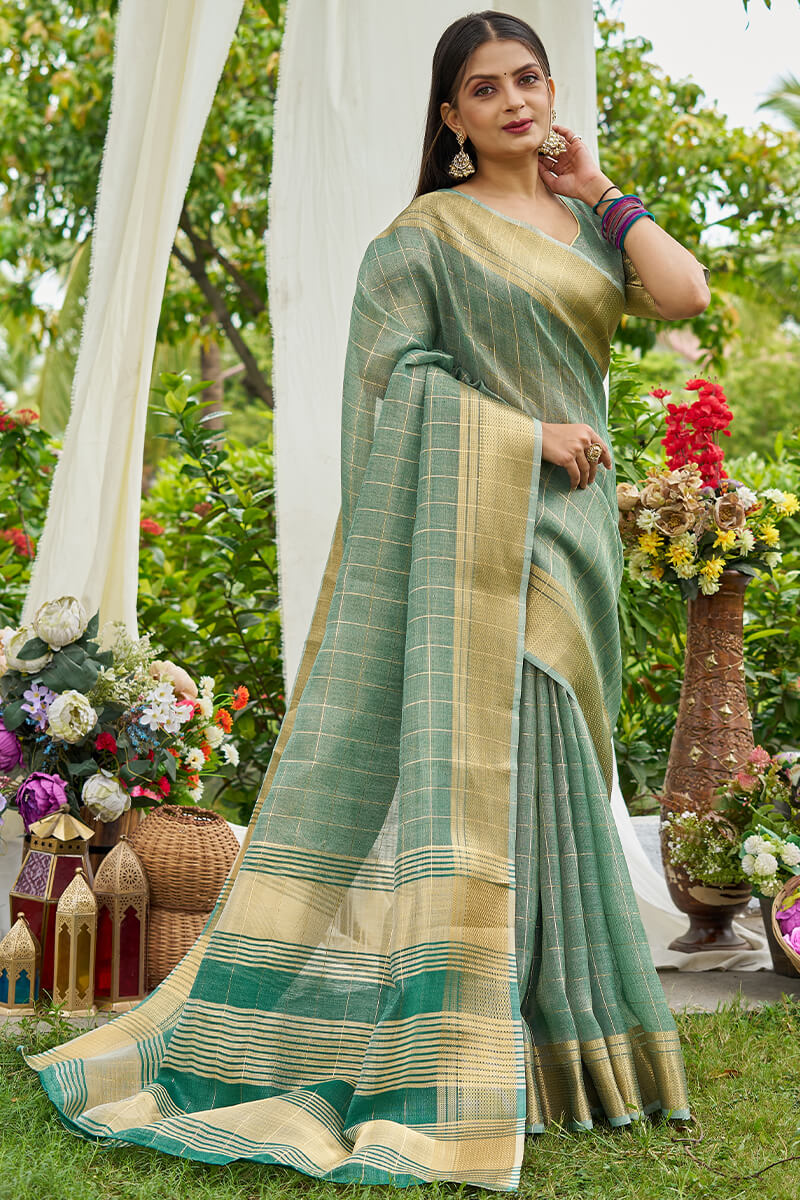 Prominent Sea Green Soft Banarasi Tissue Silk Saree With Woebegone Blouse Piece