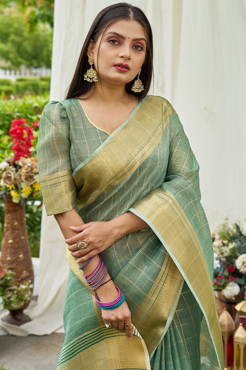 Prominent Sea Green Soft Banarasi Tissue Silk Saree With Woebegone Blouse Piece