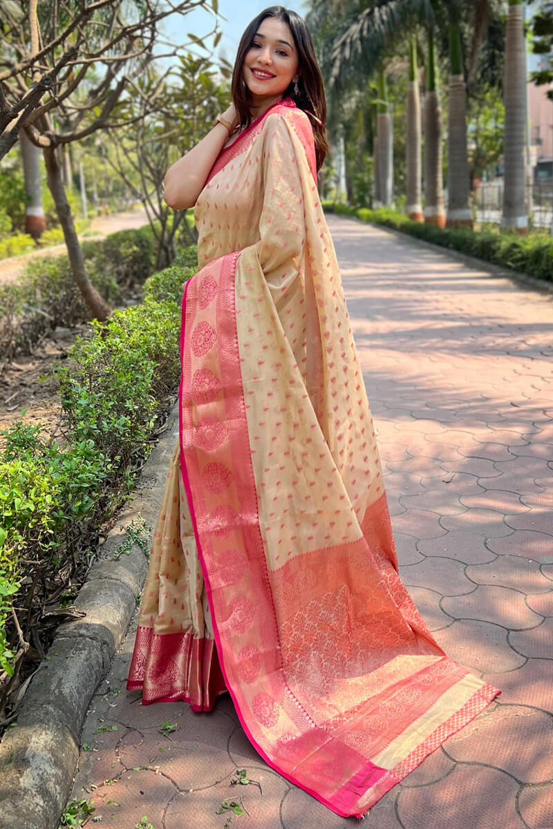 Enticing Beige Soft Banarasi Tissue Silk Saree With Palimpsest Blouse Piece