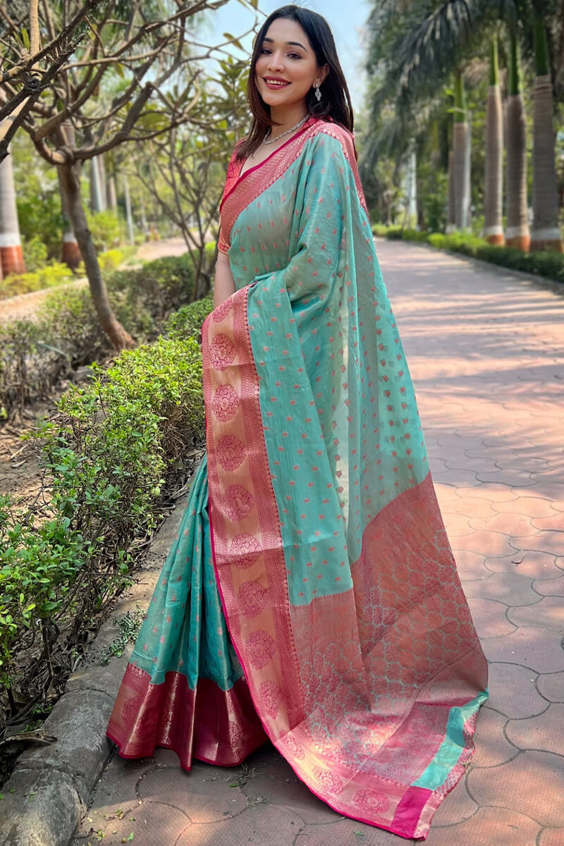 Resonant Firozi Soft Banarasi Tissue Silk Saree With Majesty Blouse Piece