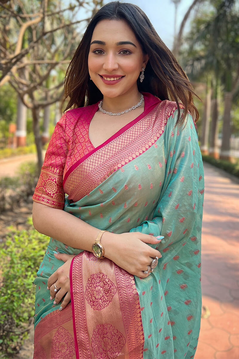 Resonant Firozi Soft Banarasi Tissue Silk Saree With Majesty Blouse Piece